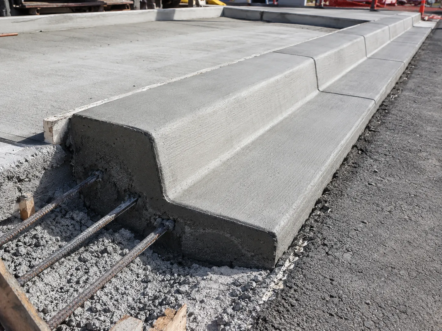Concrete Curbs and Gutters being built and completed on site by Harrowgate Group