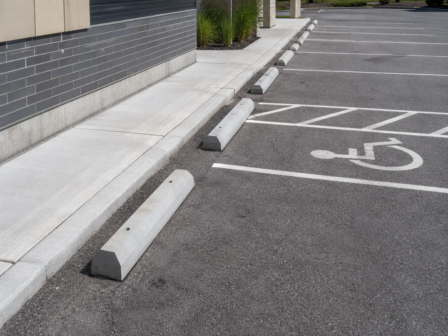 Where wheel stops and parking curbs are needed in Markham for Wheel Stops and Parking Curbs in Markham