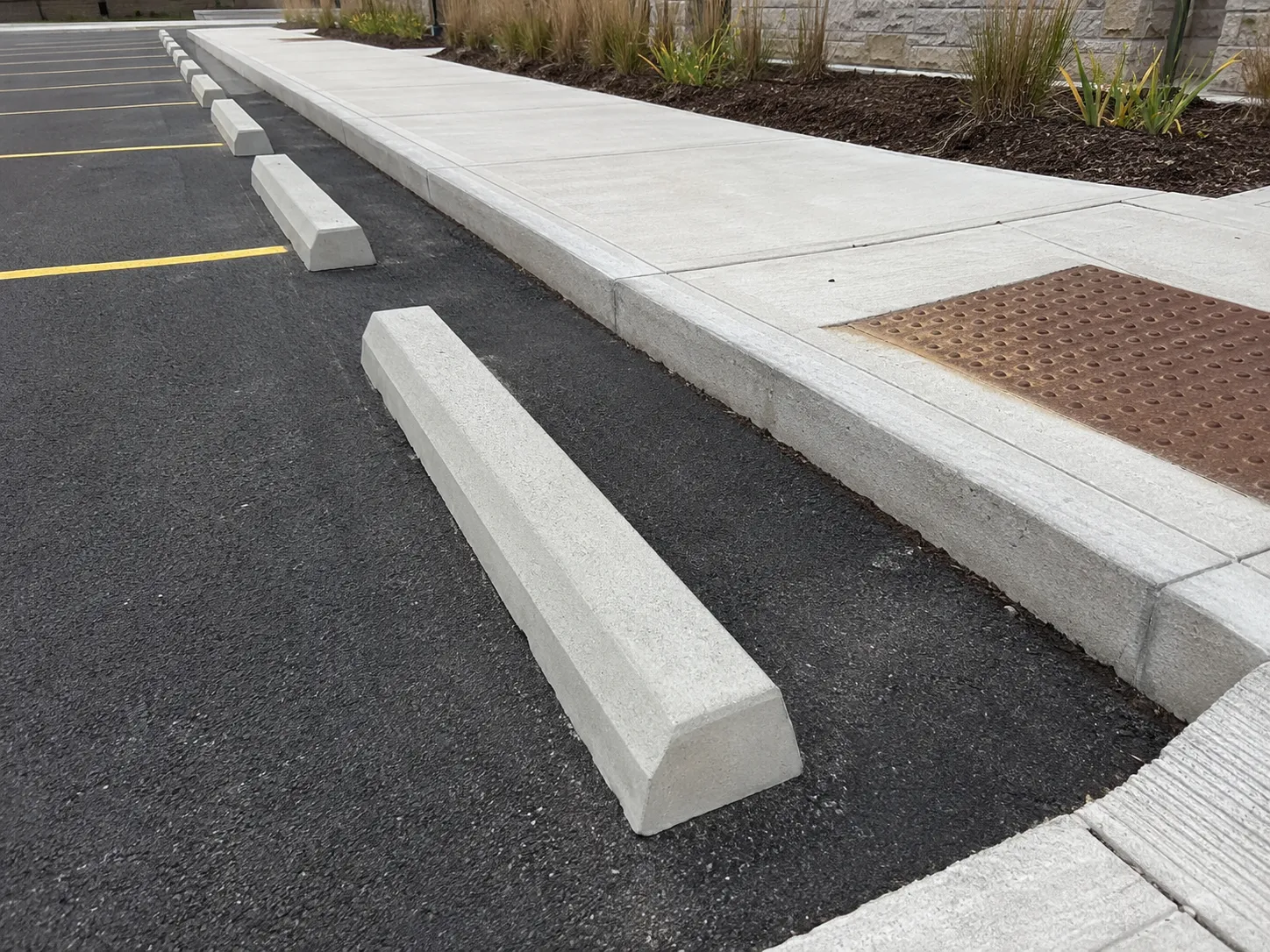 Wheel Stops and Parking Curbs in Markham being built and completed on site by Harrowgate Group